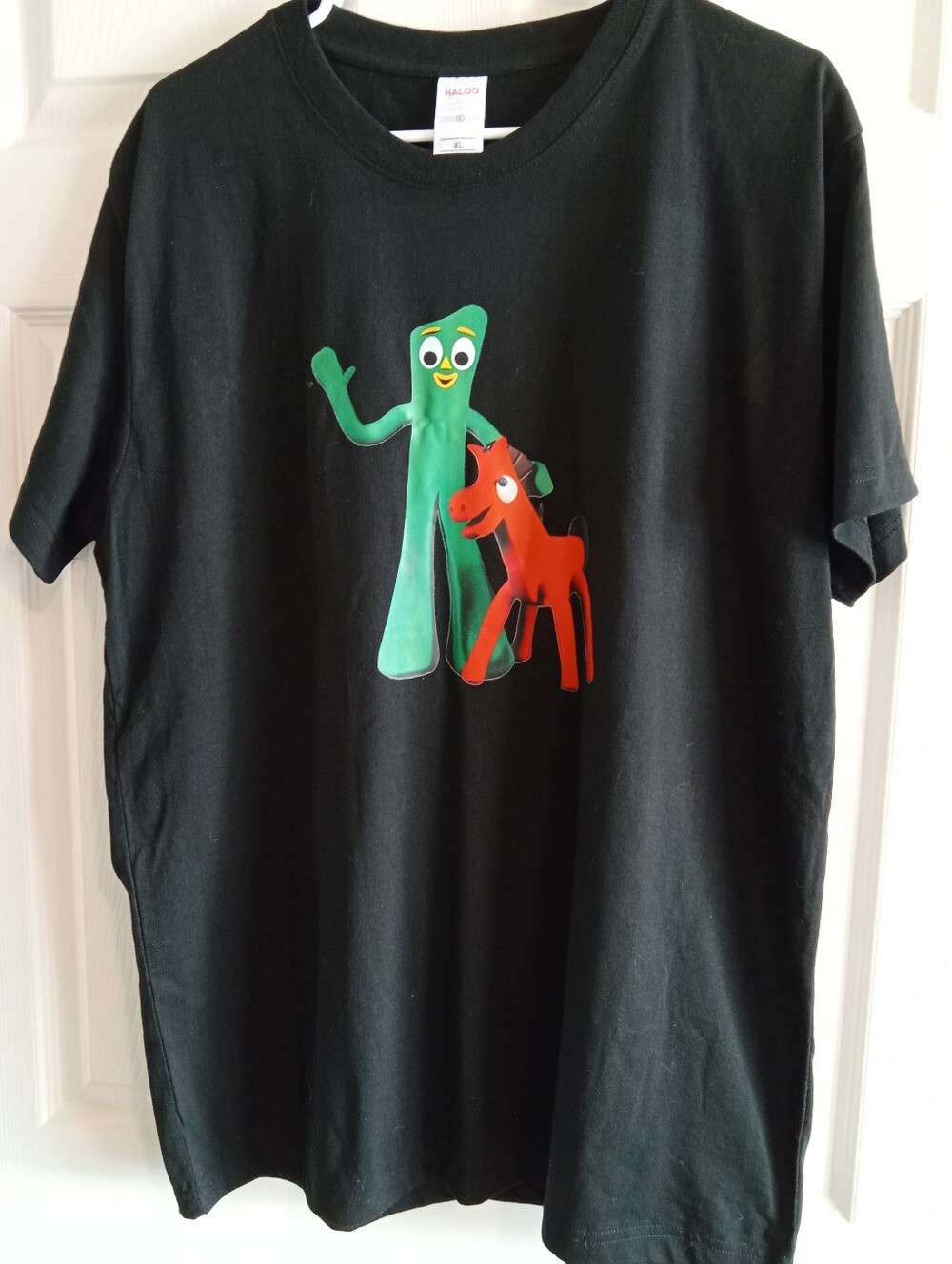 Halo Black Tee with Green Gumby-Like Character and Red Pony
